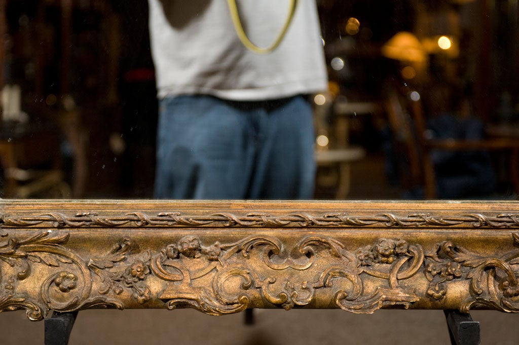 Elaborately Carved Gilt Mirror For Sale 2
