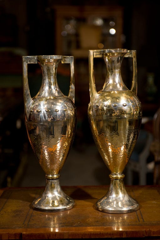 Pr. of amphora shaped hammered silverplate Arts and Crafts urn form vases.