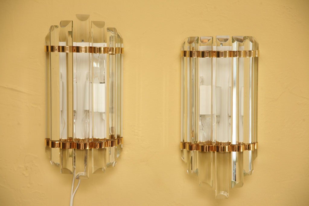 SOLD NOV 2011 Exquisite, well designed & crafted Modern Wall Sconces with tubular beveled end crystals that form a D shape profile.  The half round crystals held in place by gilt 