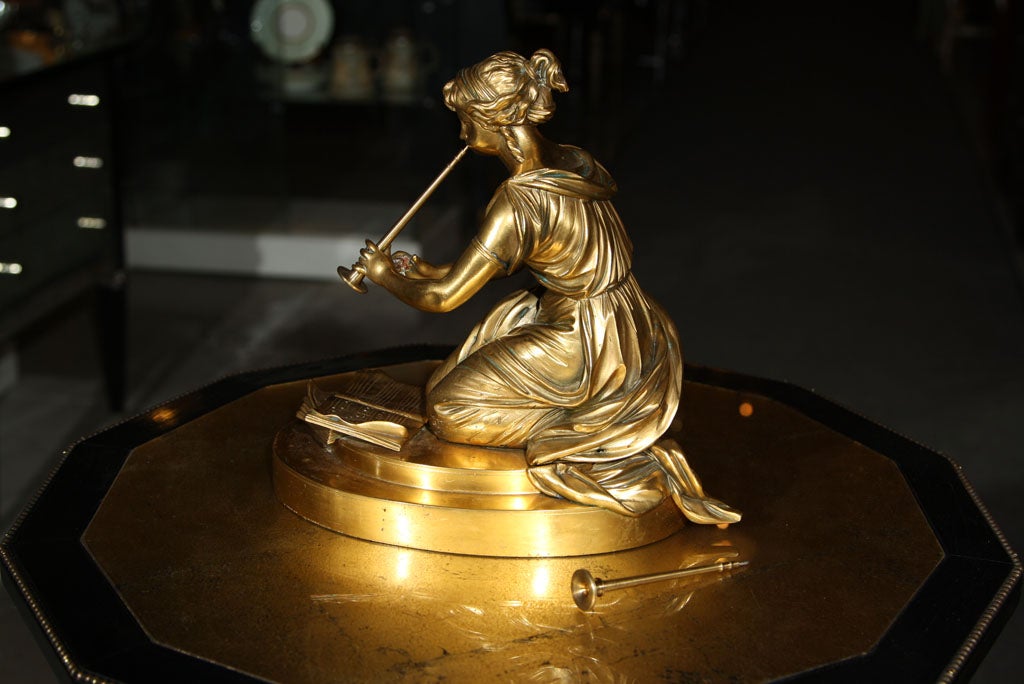 Neoclassical Gilt Bronze Figure of a Lady Playing a Flute Sculpture For Sale