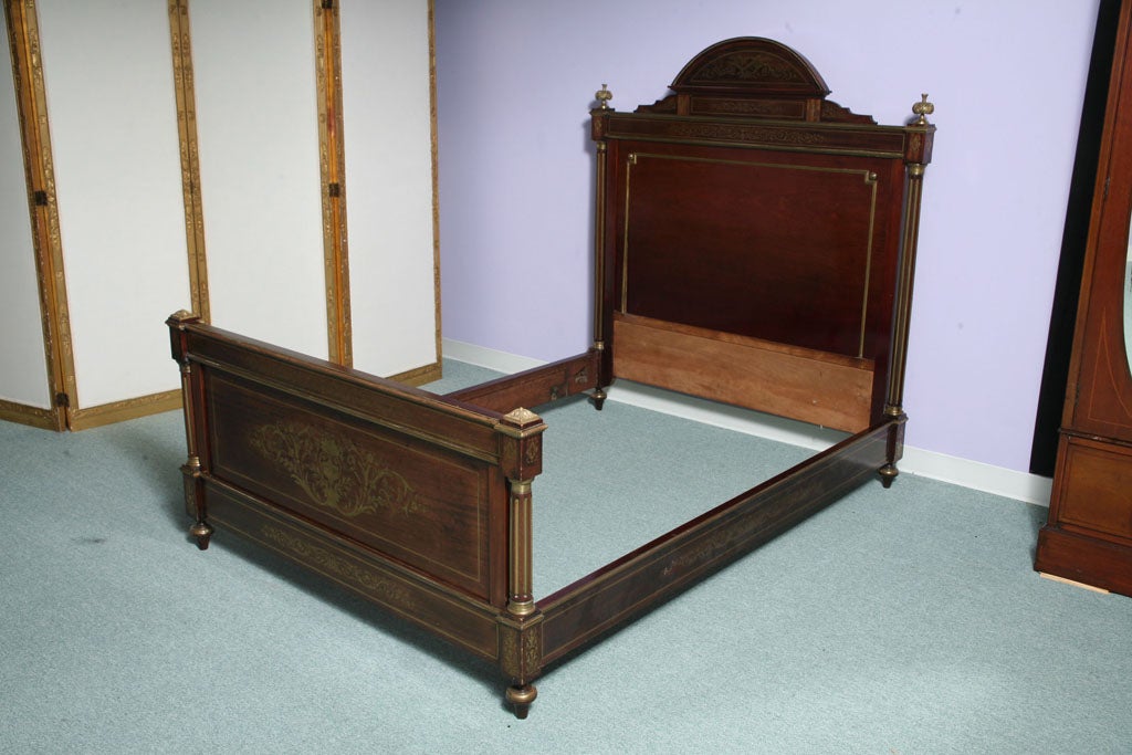 A 19th c. Antique Mahogany French bed with Brass inlay