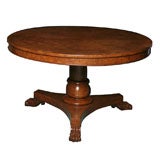 An Antique English tilt - top Breakfasr Table in Pollard Oak
