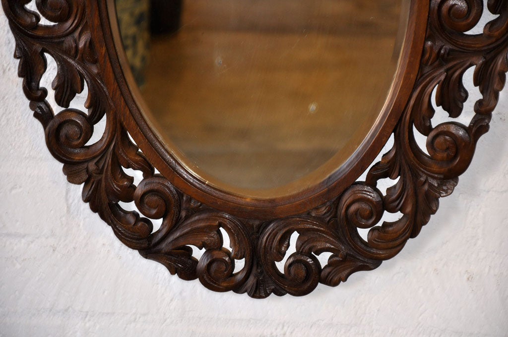 English Carved Oval Wall Mirror For Sale 1