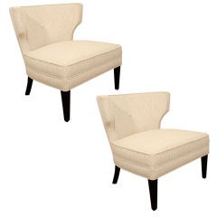 Pair of Modernage klismo slipper chairs