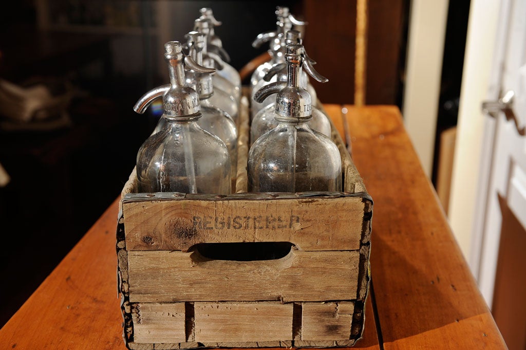 American Set of 9 vintage seltzer bottles and carrier