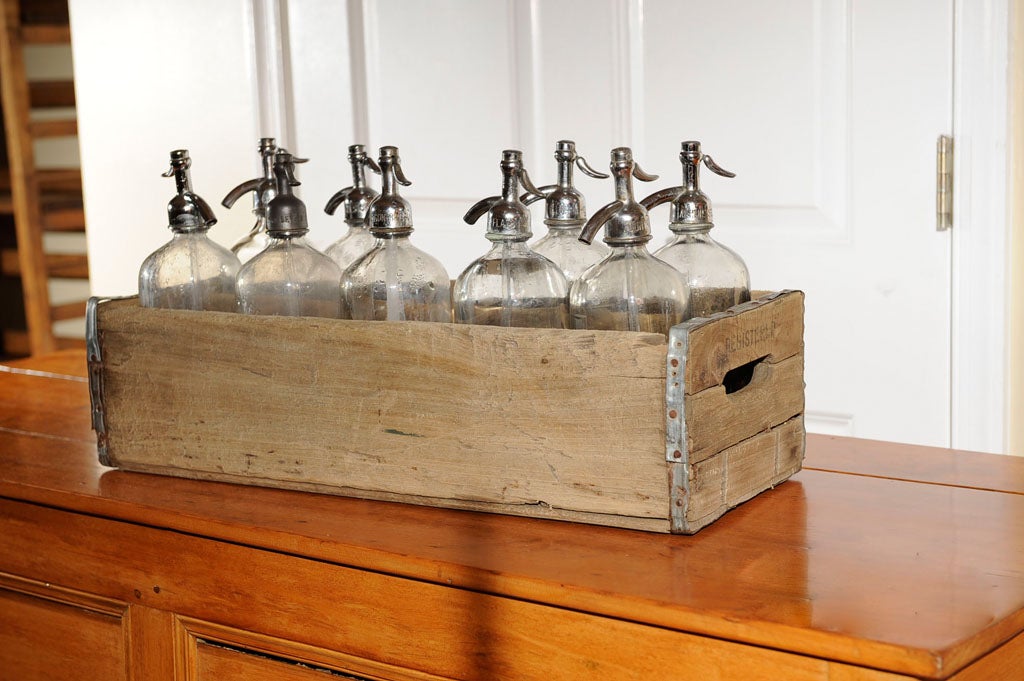 Set of 9 vintage seltzer bottles and carrier 1