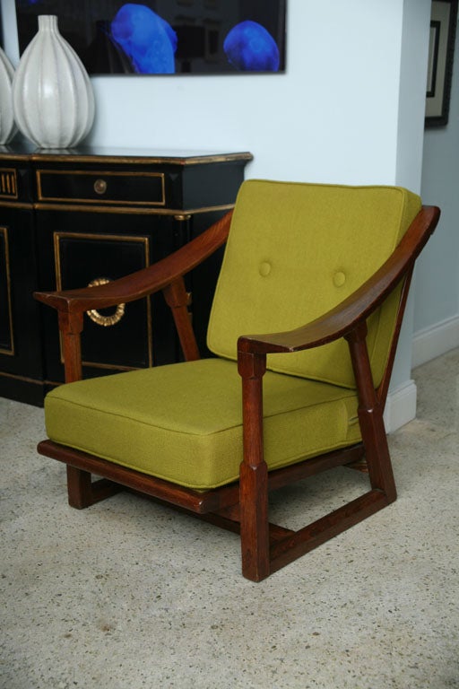 the african inspired downturned arms above columnar supports and cross stretchers to base and seat