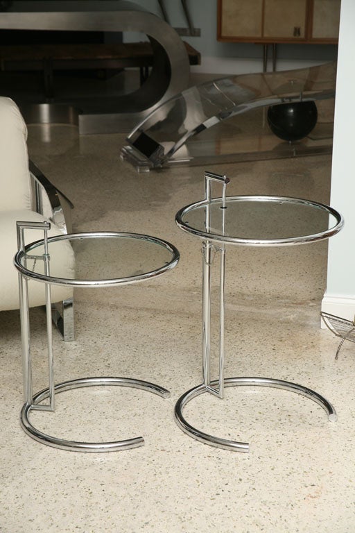 Late 20th Century A Pair of Eileen Gray Polished Chrome and Glass Tables For Sale