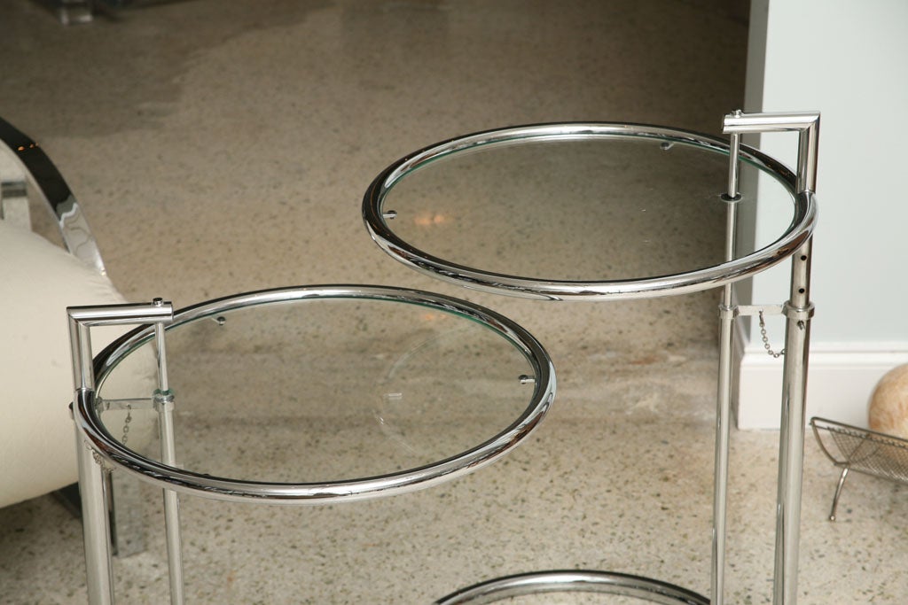 A Pair of Eileen Gray Polished Chrome and Glass Tables For Sale 1