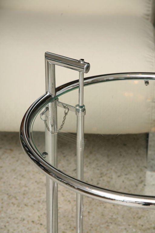 A Pair of Eileen Gray Polished Chrome and Glass Tables For Sale 2
