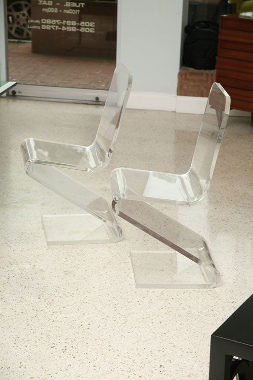 A Set of 4 Lucite Z Chairs