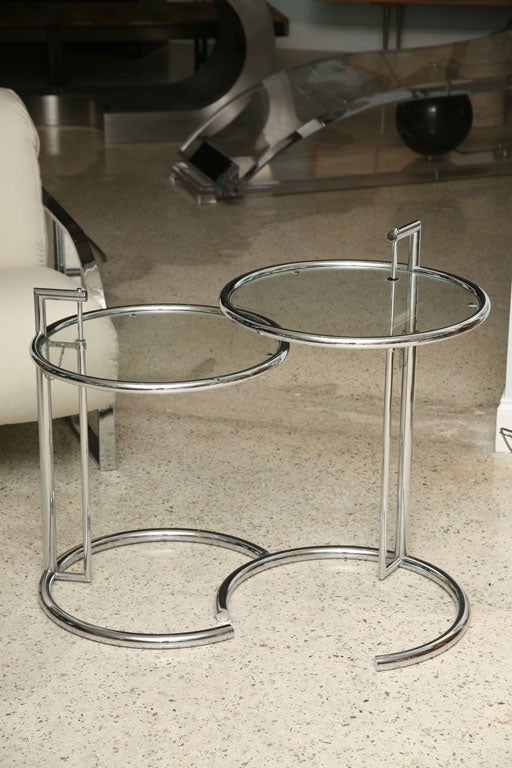 A Pair of Eileen Gray Polished Chrome and Glass Tables For Sale at 1stDibs