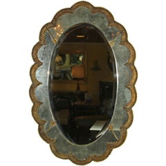Pair of Venetian oval mirrors
