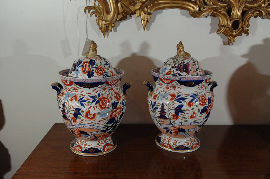 pair of Mason's ironstone potpourri jars with both open and closed lids having Imari coloration, cobalt handles and Foo dog tops