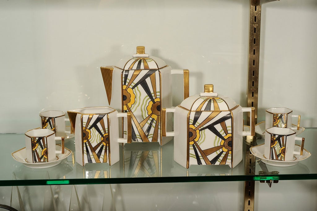 A beautiful French Art Deco 27 piece coffee set by Jean Boyer for Limoges, created c. 1920, comprising twelve cups, twelve saucers, a coffee pot, sugar bowl and creamer, each stamped Limoges France/Jean Boyer.<br />
<br />
Dimensions: Cups H. 2
