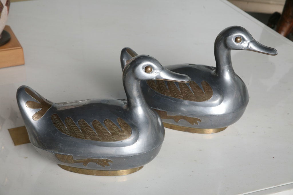 Life size pewter duck boxes with brass details. Fabulous construction and details. Dark pewter finish, aged brass.