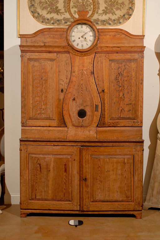 Late 18th Century Clockskap(Clock Cupboard) from Sweden with original Faux Bois Finish (Paint Imitating Wood). Please Note This Item is an Antique and is One of a Kind. 