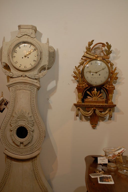 18th Century Swedish Giltwood Cartel Clock with Lyre, Wheat Sheaves, and Classical Drapery.  One of a kind clock.  Please<br />
visit our website to see others www.jadamsantique.com