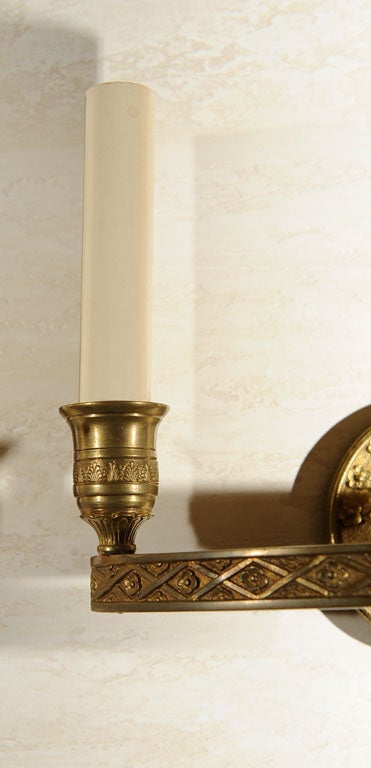 Pair of E.F. Caldwell & Co 3 light Sconces