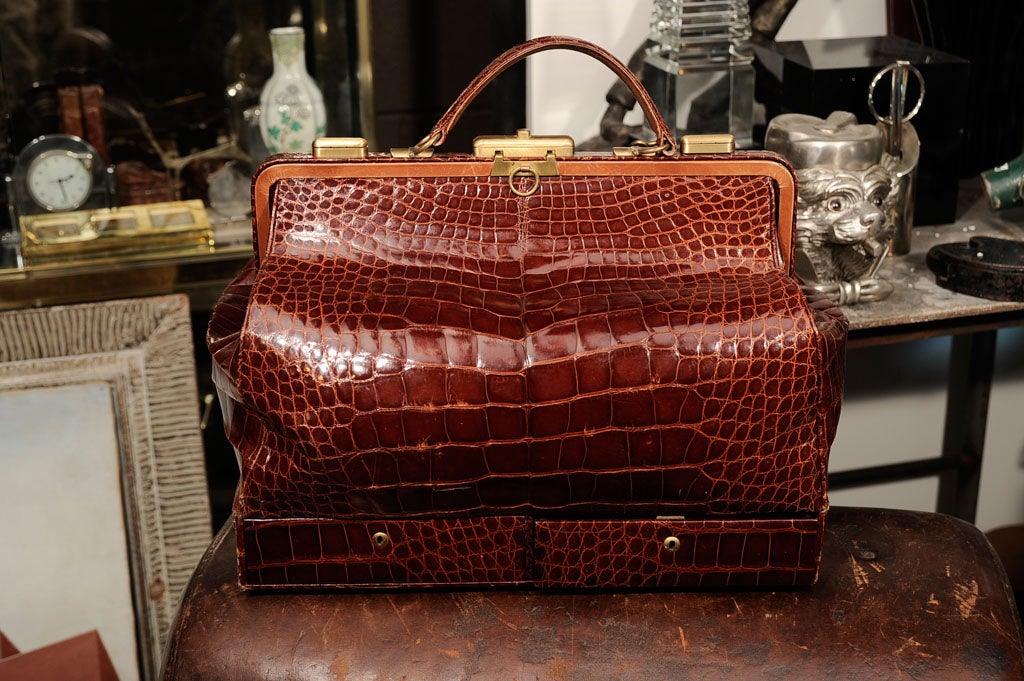 Incredible baby crocodile bag in the form of a doctor's satchel with two jewelry drawers below. Handmade in Italy by Maxima.