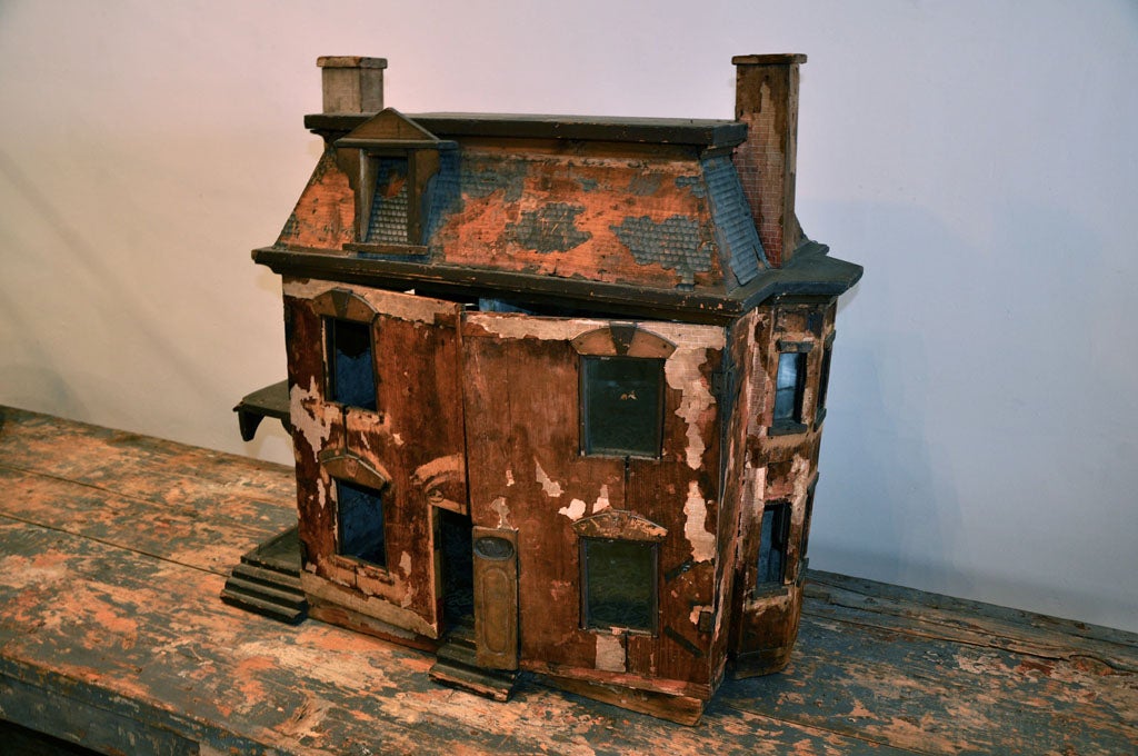 a dollhouse whose decimated condition is truly it's most beautiful quality.
