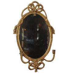 Antique French giltwood "rope" mirror with candleholders