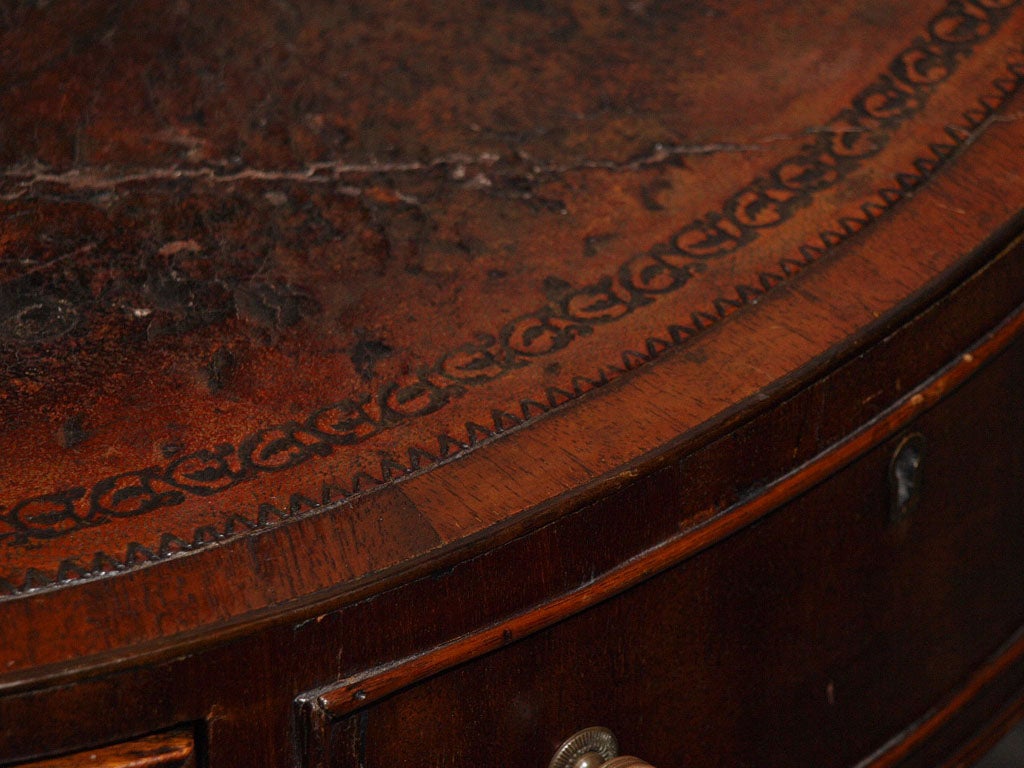 Antique English mahogany leather top rent table. In Good Condition In New Orleans, LA