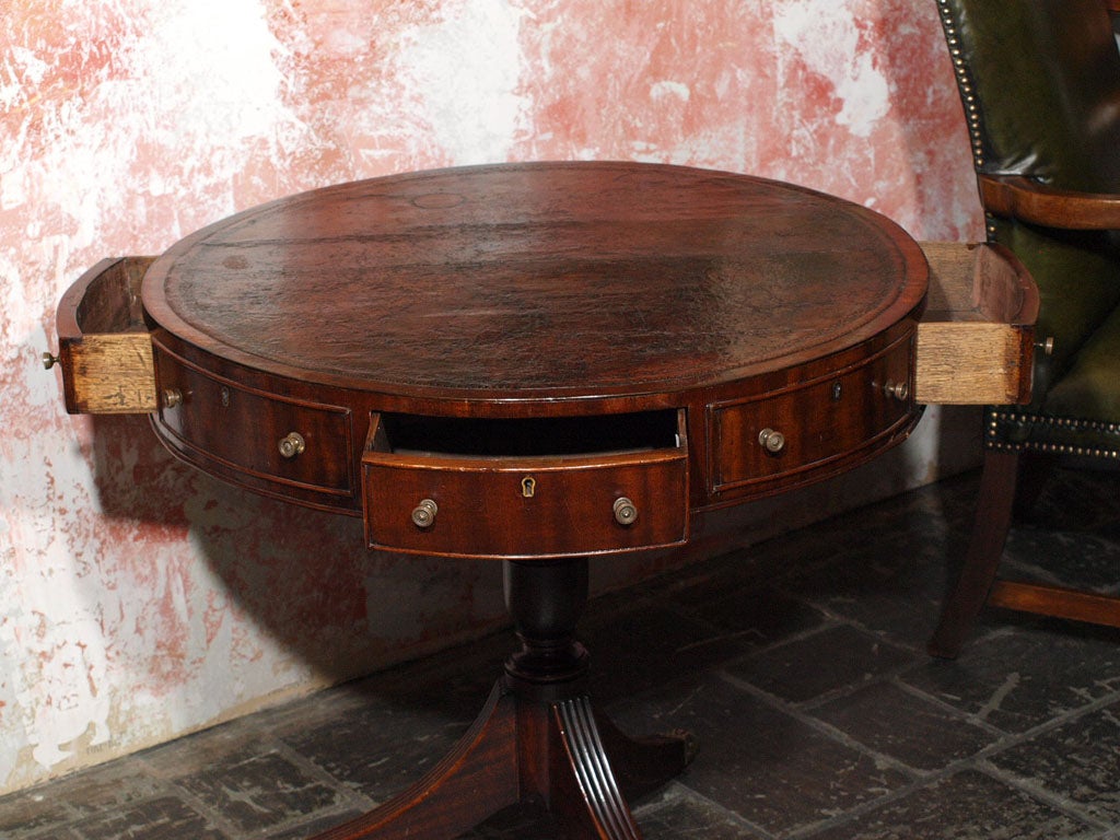 Mahogany Antique English mahogany leather top rent table.
