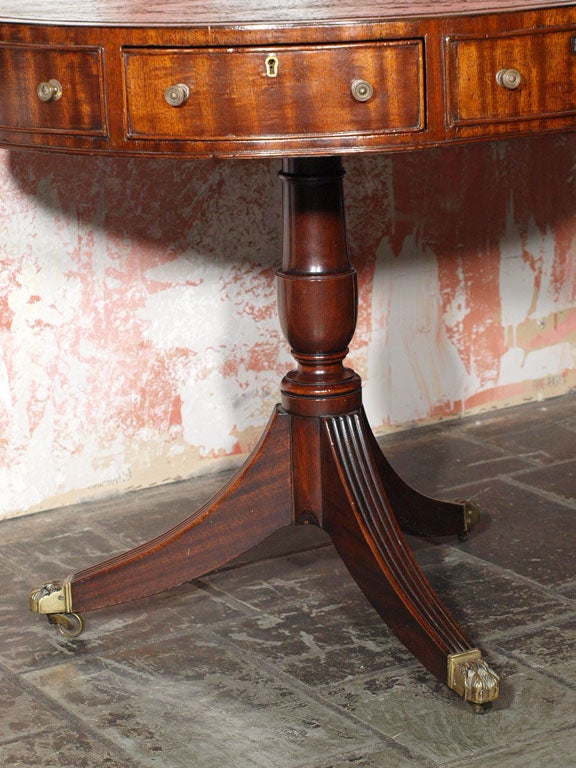 Antique English mahogany leather top rent table. 1