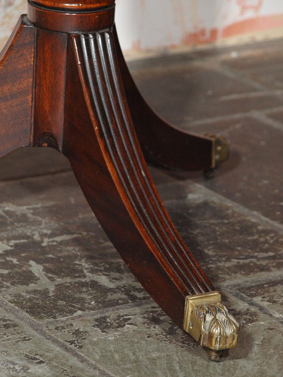 Antique English mahogany leather top rent table. 3