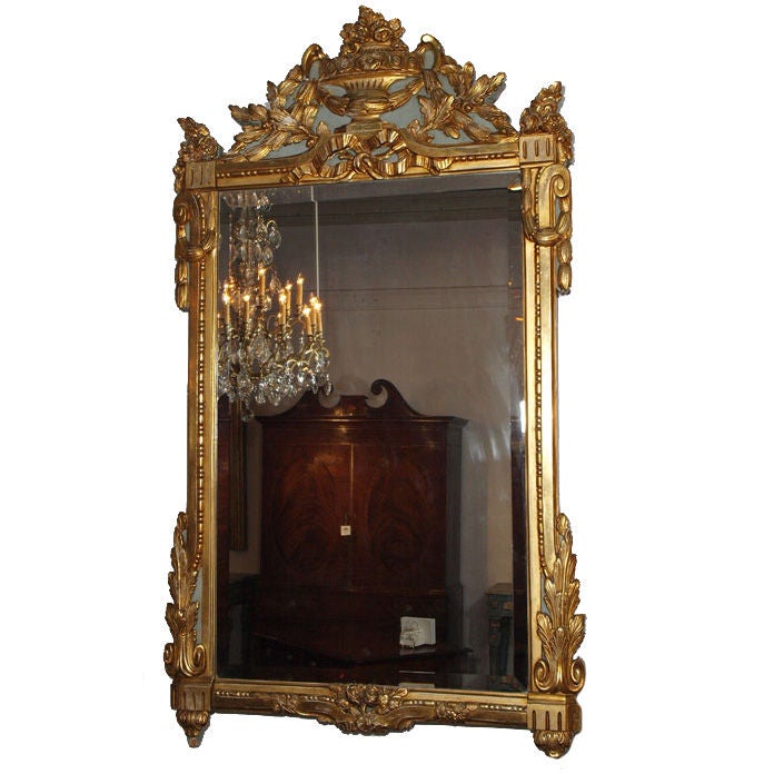 18th century Louis XVI gold leaf mirror with bevelled glass.