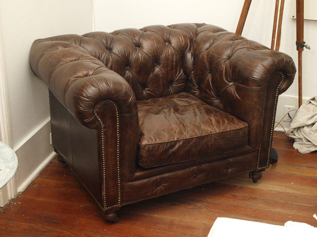 This is such a beautiful tufted sofa chair that you'll be fighting with the man in your life over it. No, it is not just a man's chair. It is a gorgeous chair that anyone and everyone would love. Brand new but made with vintage leather for that