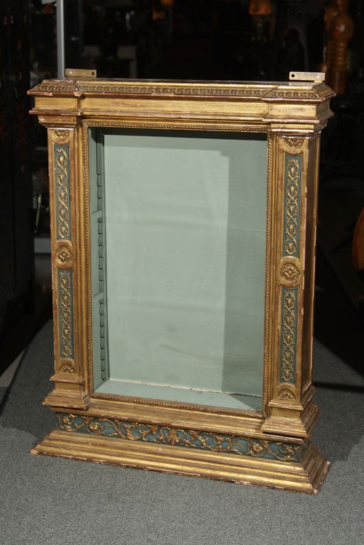 No, not THAT High Grant.  Hugh J. Grant the mayor of New York City in the late 19th Century.  Mr. Grant's home was outfitted with several altar pieces and gilded objects.  This tabernacle style case is hand carved and hand gilt, with pastiglia and