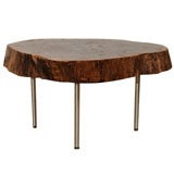 Artisan black walnut slab table with stainless steel legs