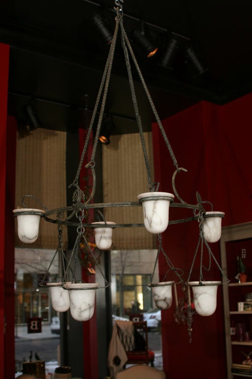 A Bronze and Alabaster 'Kerylos' Eight-Light Chandelier