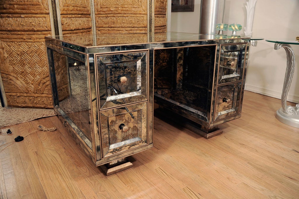 Mirrored Chinoiserie partners desk. Features four drawers on each side and shell pulls.<br />
<br />
View our complete collection at www.johnsalibello.com