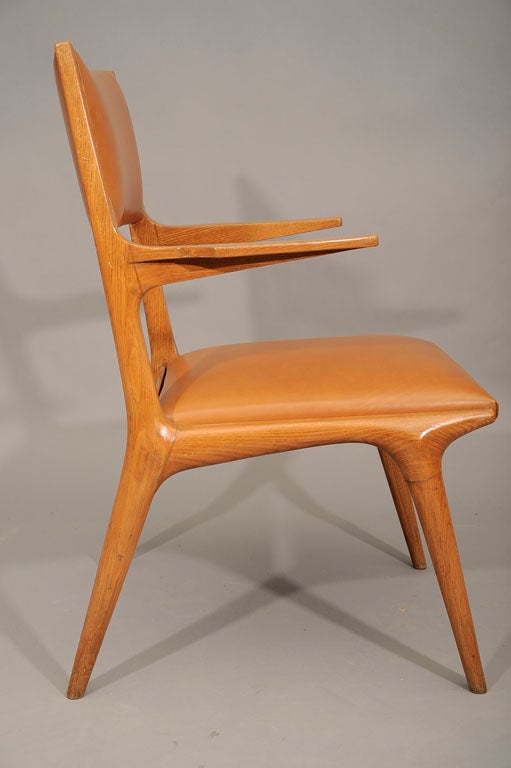 Italian A rare leather arm chair by Carlo de Carli For Sale