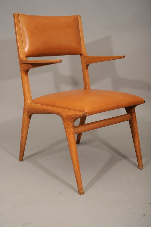 Leather A rare leather arm chair by Carlo de Carli For Sale