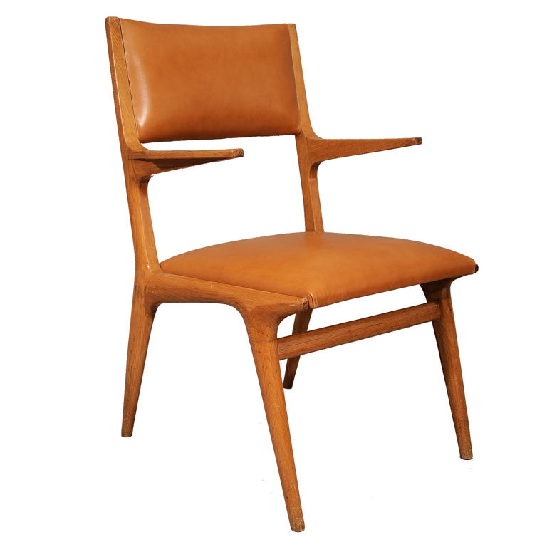 A rare leather arm chair by Carlo de Carli For Sale