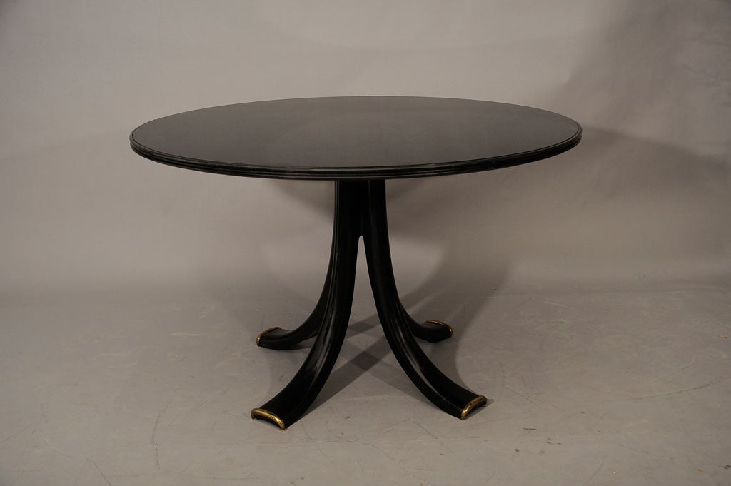 Wood A large dining table by Osvaldo Borsani For Sale