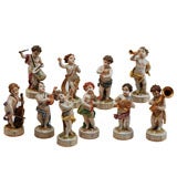 Antique Set of 10 Capo Di Monte Putti Figurines Depicting Musicians