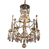 Gilt bronze and cut crystal six light chandelier.