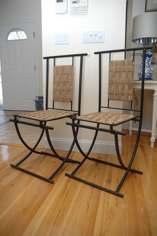 Set of four Mid-Century Moroccan folding chairs.
