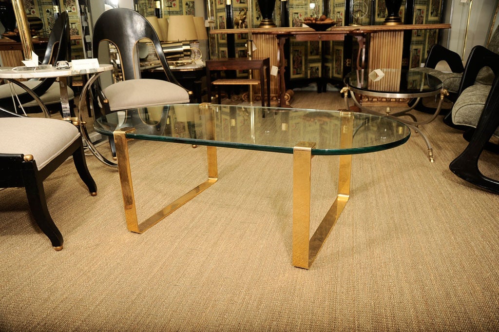 Oval Glass Top Coffee Table with Banded Brass Base