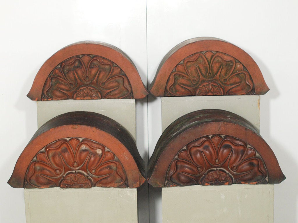 A Set of Four English Terra-cotta Corbels/Architectural Elements