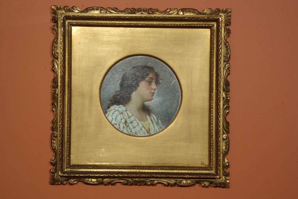 A finely-rendered circular oil on cardboard of a lovely peasant girl by Italian artist Tito Conti (Italian, 1842-1924). Signed at lower right. Conti is a painter of genre scenes. Born in Florence where he lived and worked for most of his life. He is