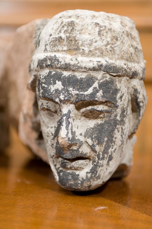 Carved facial keystones