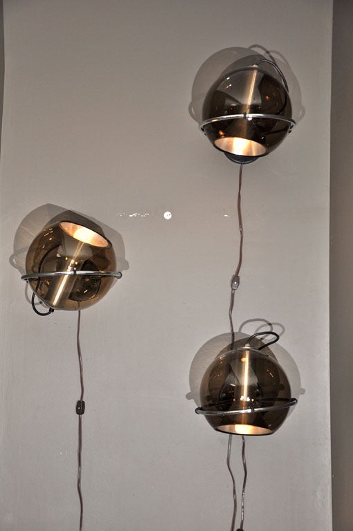 Raak Glass Globe Sconces