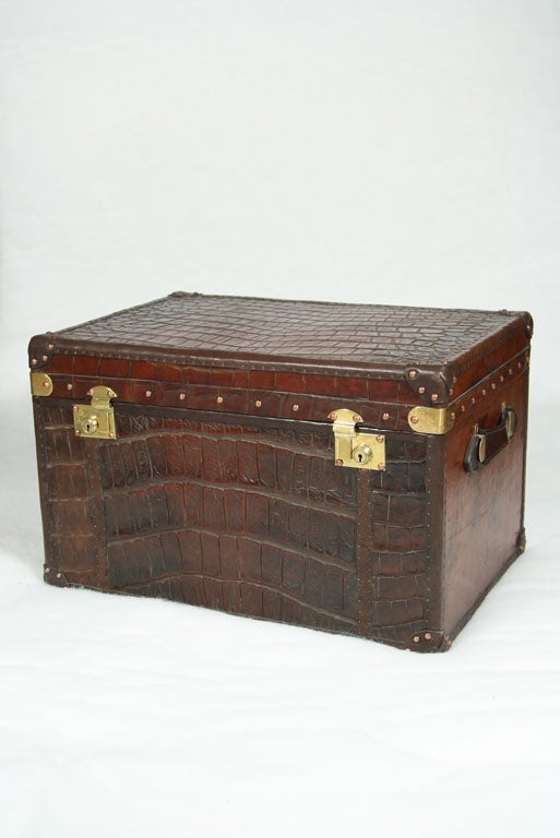 Vintage trunk re-covered with vintage crocodile skin, with brass fittings and lock.