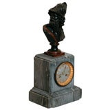 Antique A French Empire style clock with bust of Menelaus on top